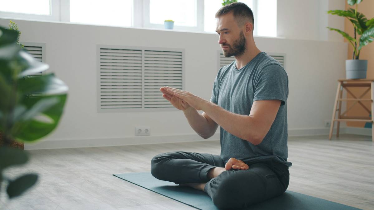 Woman using calm meditation app buddhify while riding a bus